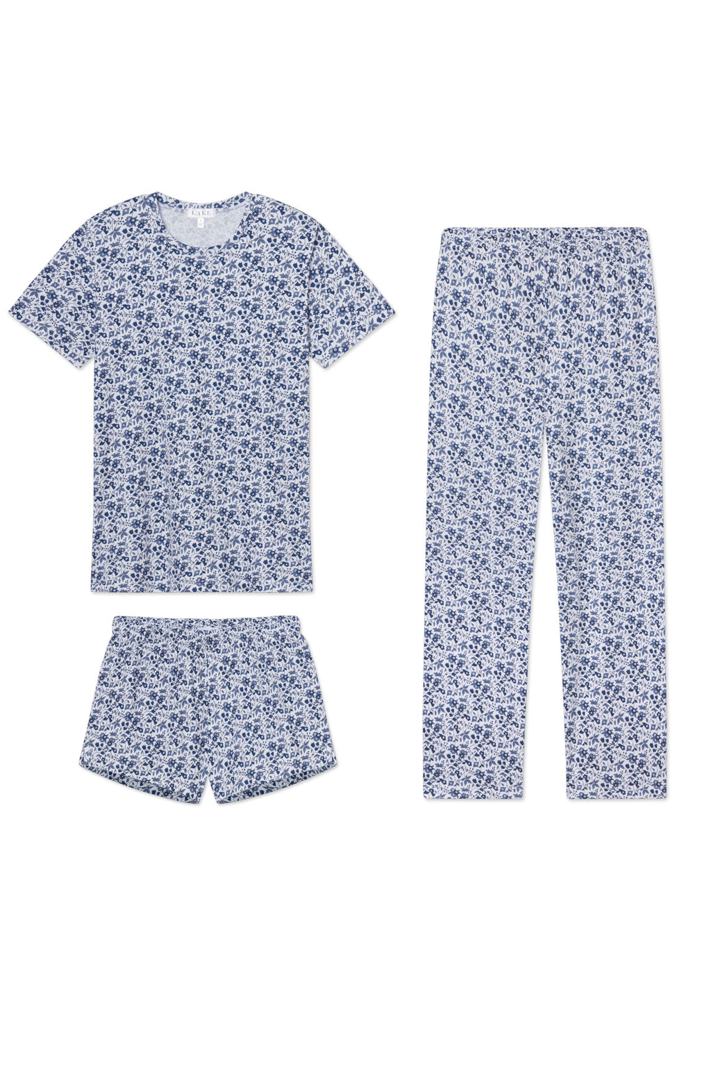 The Pima Crew Bundle in Sea Depth Garden Floral includes a short-sleeve crewneck T-shirt, long pants, and shorts, all crafted from 100% Pima cotton and shown on a white background.