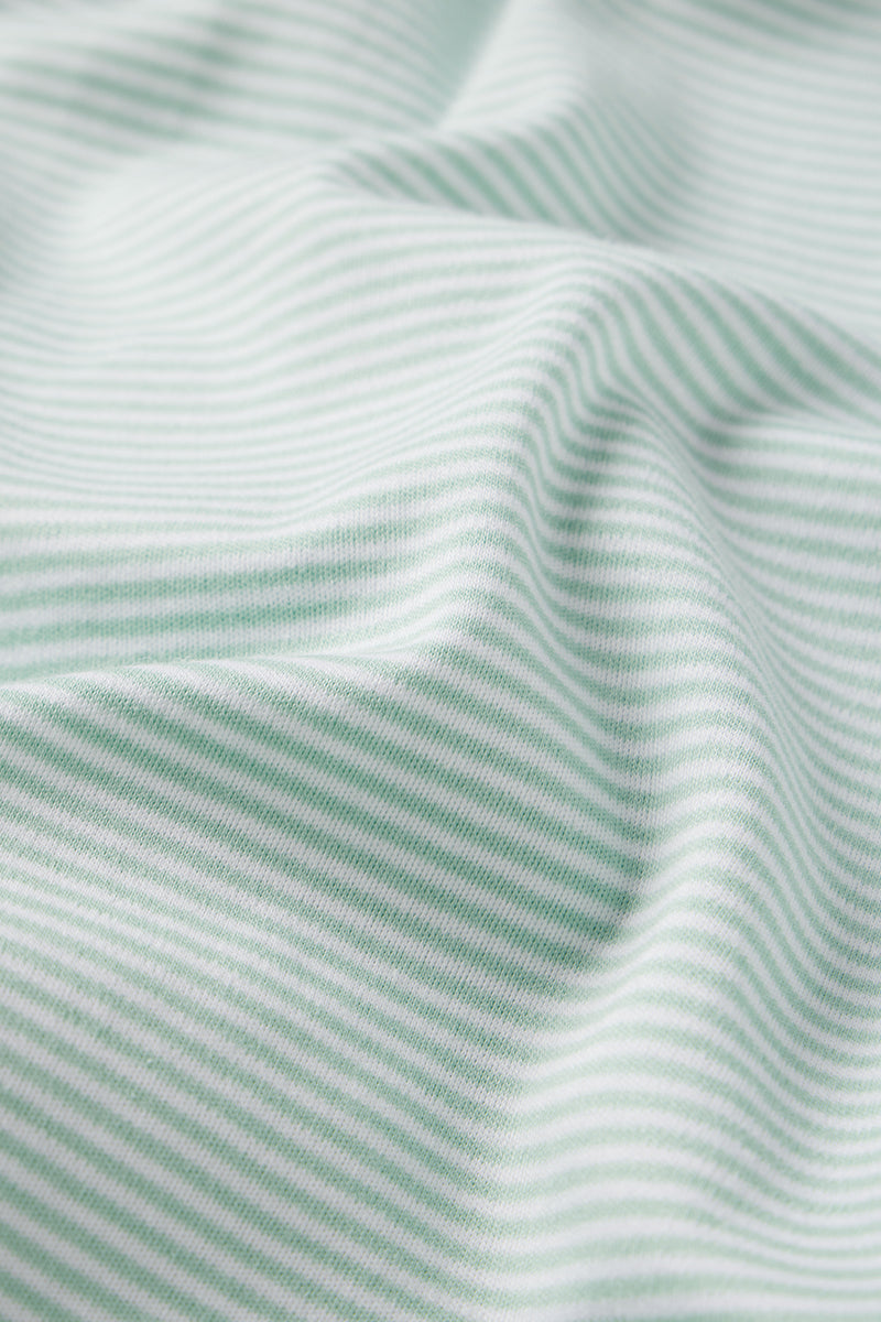 Close-up of the Pima Short-Long Set in Parisian Green, highlighting its soft Pima cotton fabric with thin green and white horizontal stripes—ideal texture and pattern for a comfy pajama set.