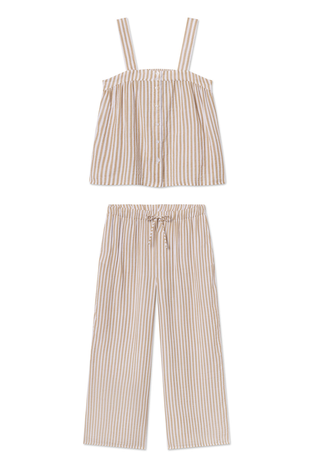 The Hamptons Pants Set in Sandstone Awning Stripe is a two-piece gauze pajama set with beige and white vertical stripes, featuring a sleeveless button-front top and loose drawstring pants—ideal for hot sleepers.