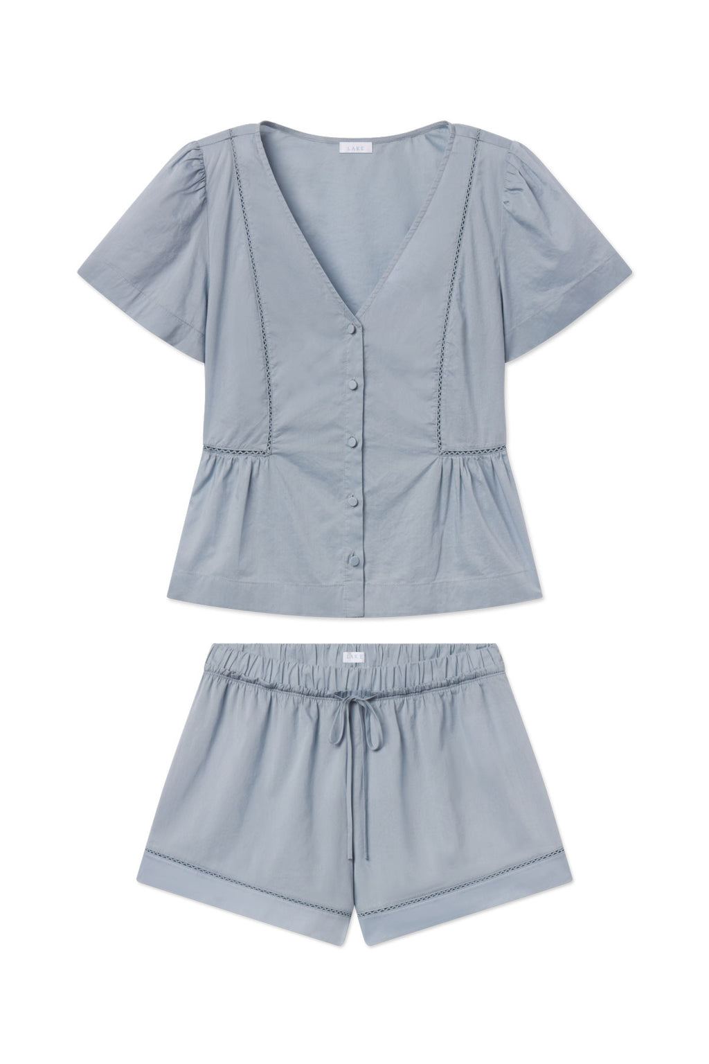 Dusty blue two-piece set with puffed sleeve button-up top and elastic-waist shorts, both featuring decorative stitching detai
