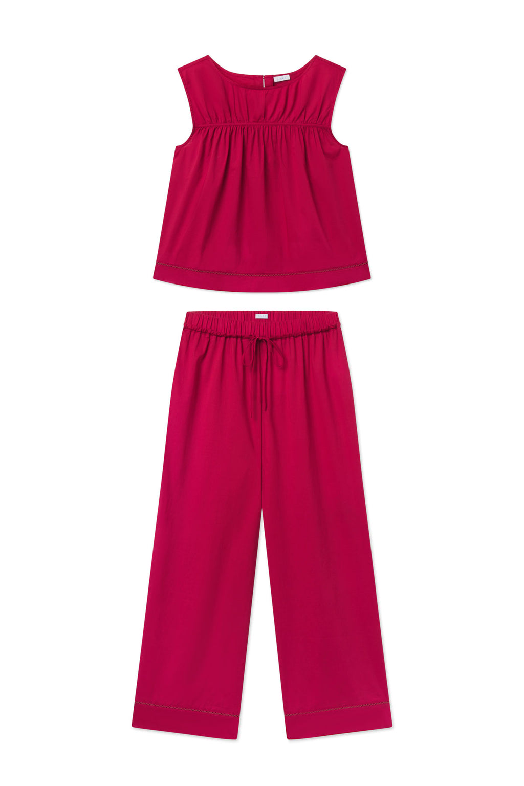 Burgundy sleeveless tank top with gathered waist and matching wide-leg pants with decorative trim.