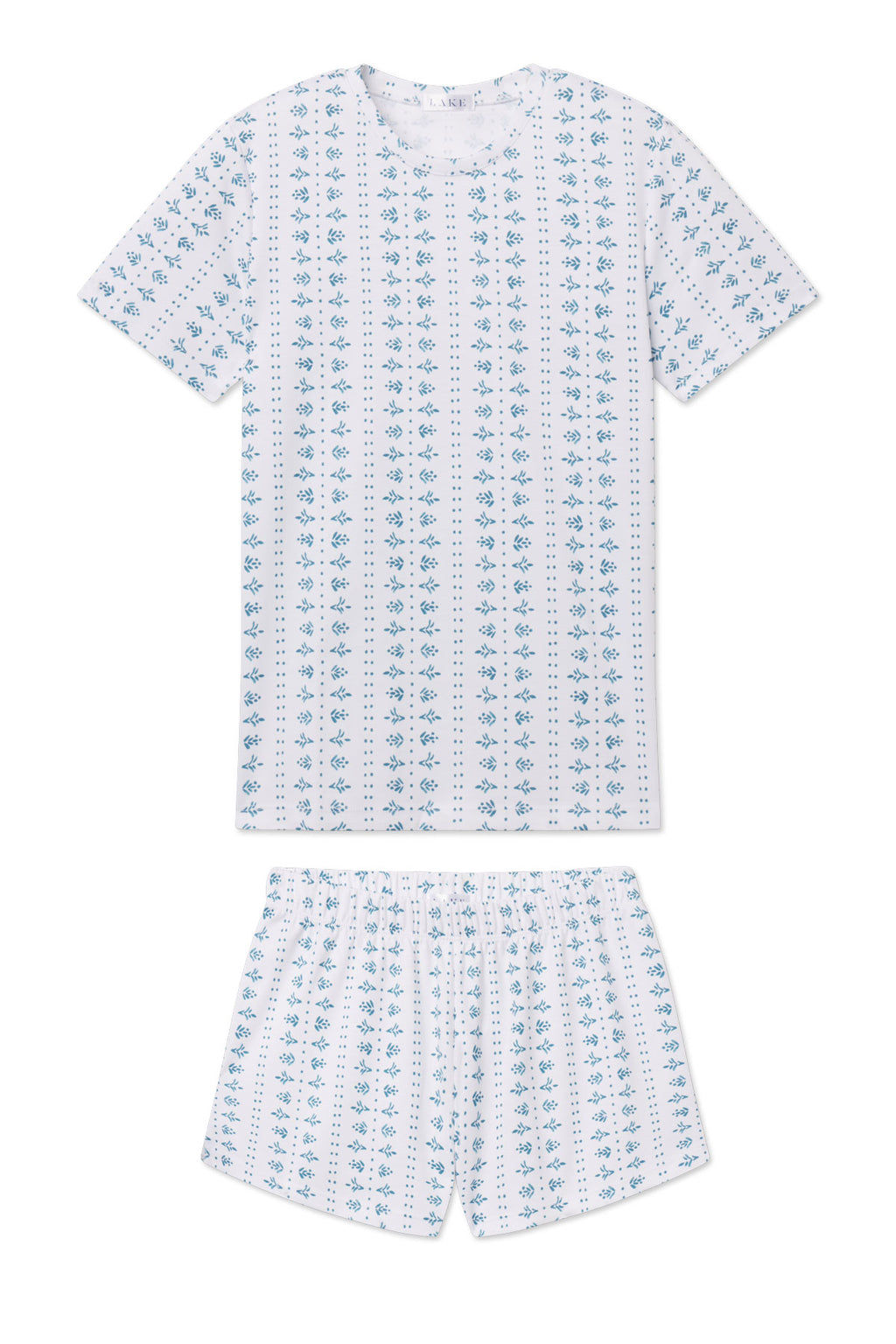 White crew neck short-sleeve shirt and shorts set with blue floral and geometric pattern throughout.