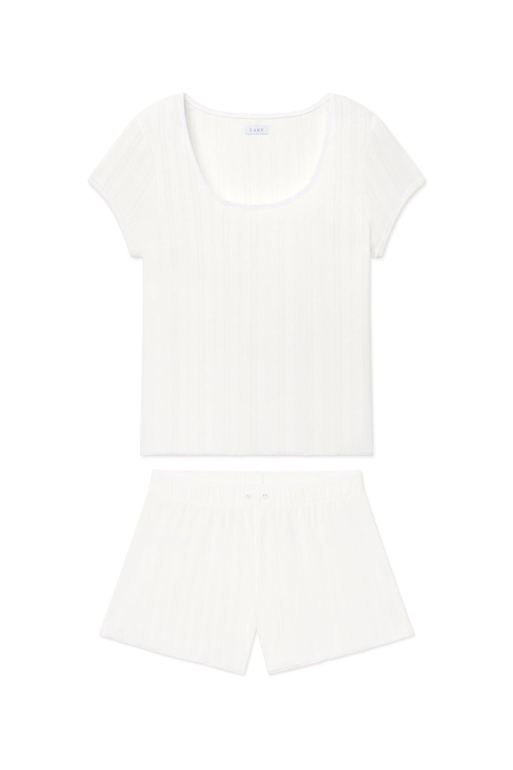White pointelle short-sleeve top and shorts set with ribbed texture and scoop neckline.