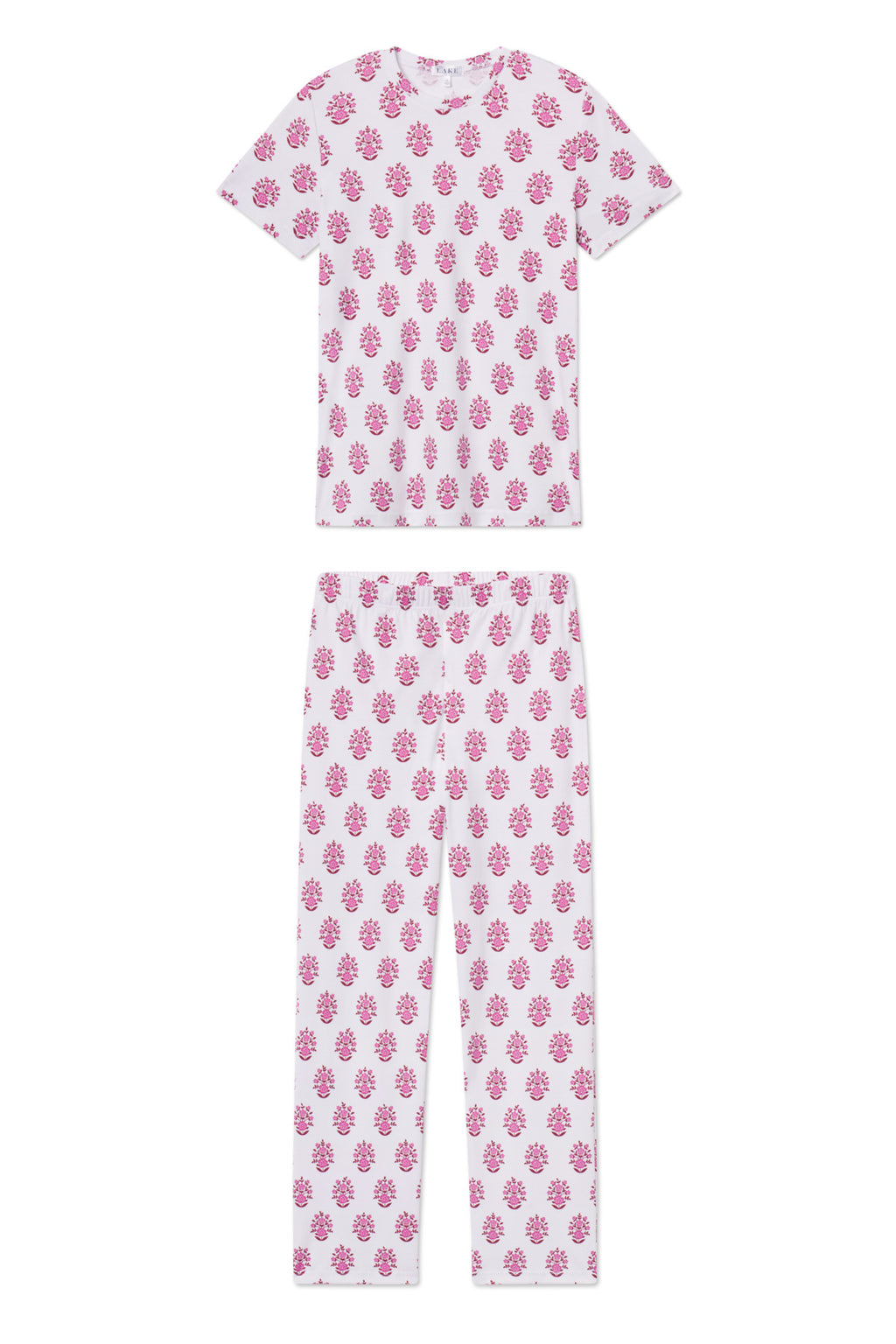 The Pima Crew Short-Long Set in Cabernet Cottage Floral is a matching pajama set in soft Pima cotton, featuring a short-sleeved shirt and high-waisted pants with a pink floral print on white, arranged flat with the shirt above the pants.