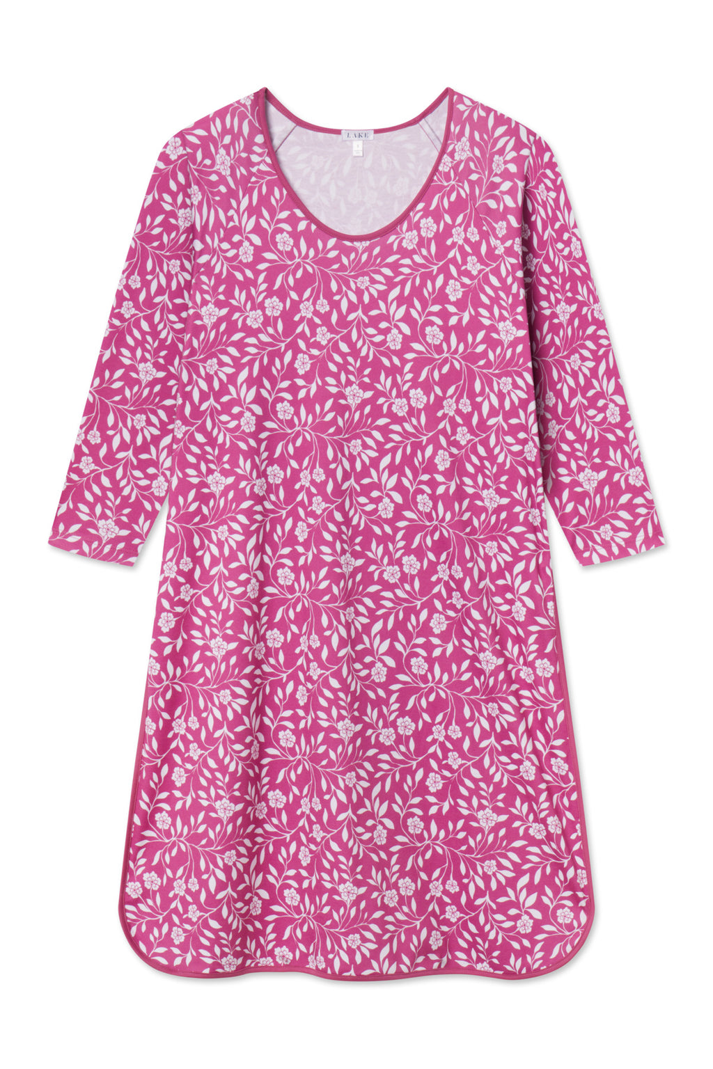 The Pima Long Sleeve Nightgown in Camellia Cecil Floral features a pink hue with white floral and leaf patterns, a round neckline, and a loose A-line silhouette for women.