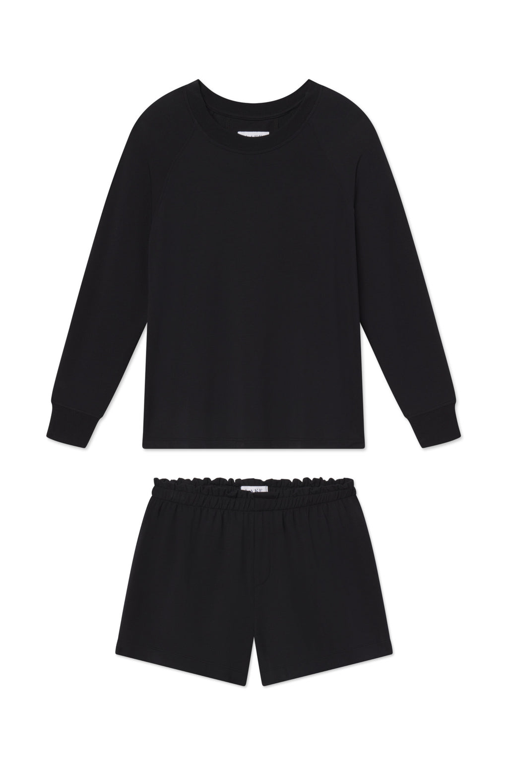 The Relax Shorts Set in Black includes a soft modal long-sleeve crew-neck top and relaxed elastic-waist shorts, shown laid flat on a white background.