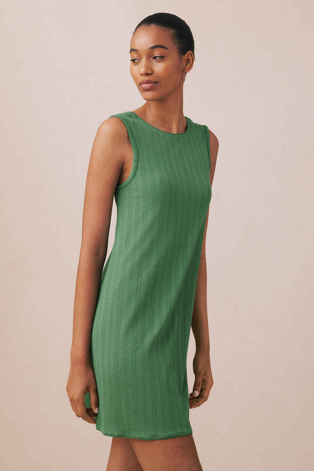 Green pointelle tank gown with vertical ribbed texture and crew neckline on model.