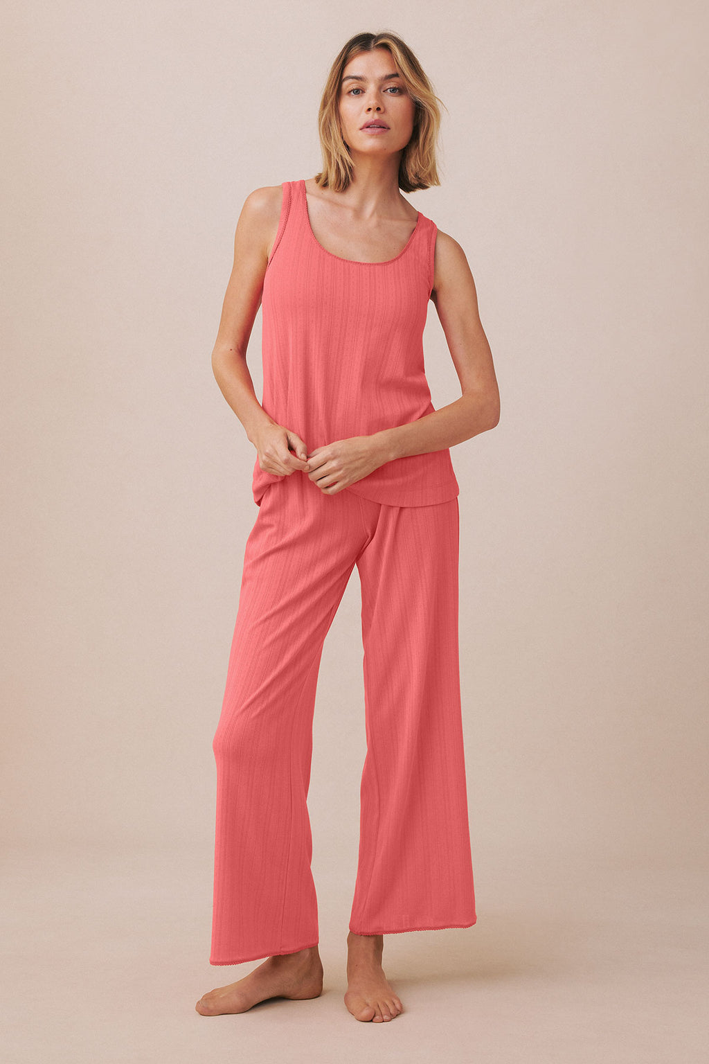 Terrace pointelle tank top and wide-leg pants set in coral pink with ribbed texture.