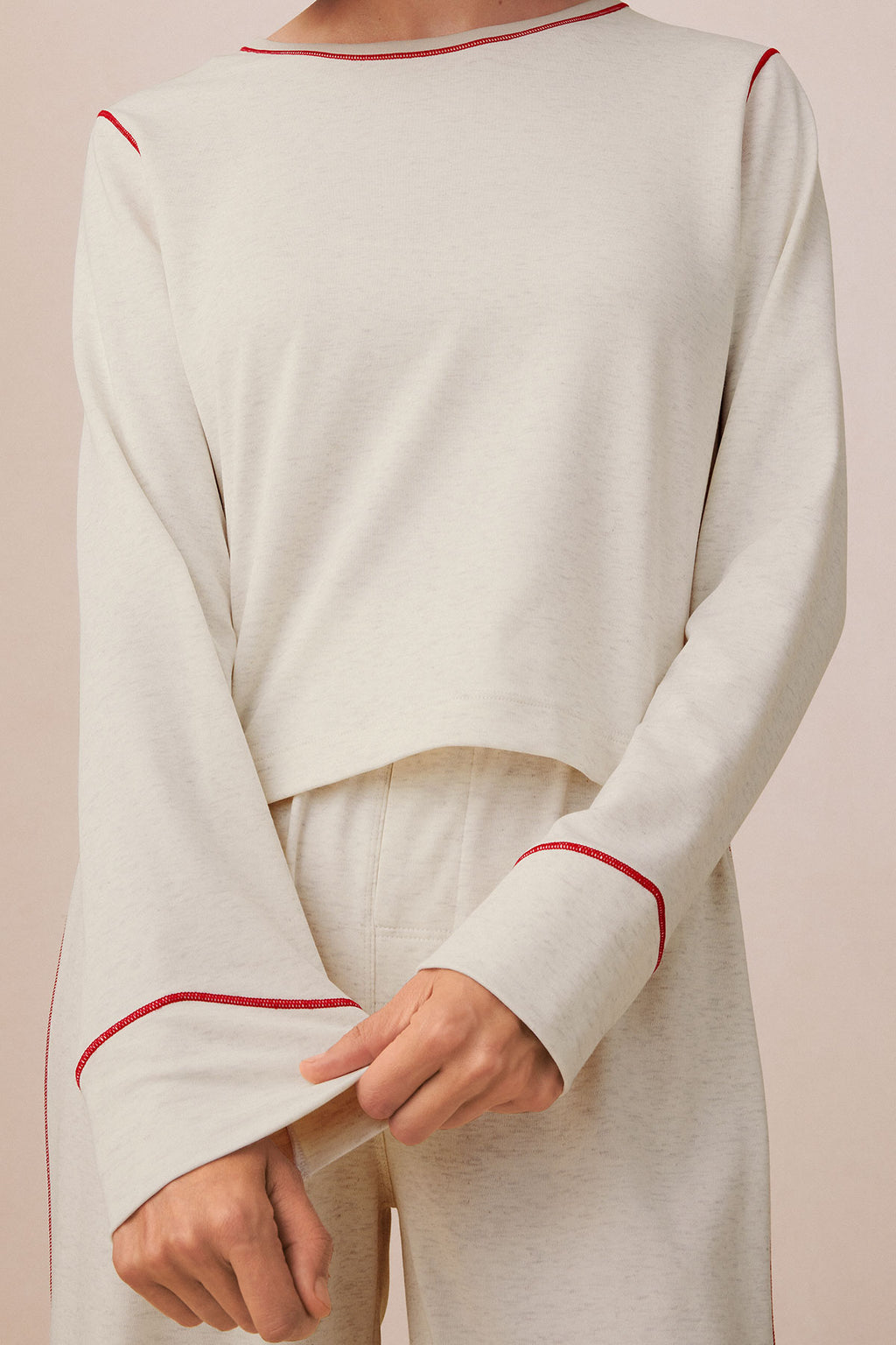 Stone heather long-sleeve top and pants set with red trim detail on neckline, cuffs, and side seams.