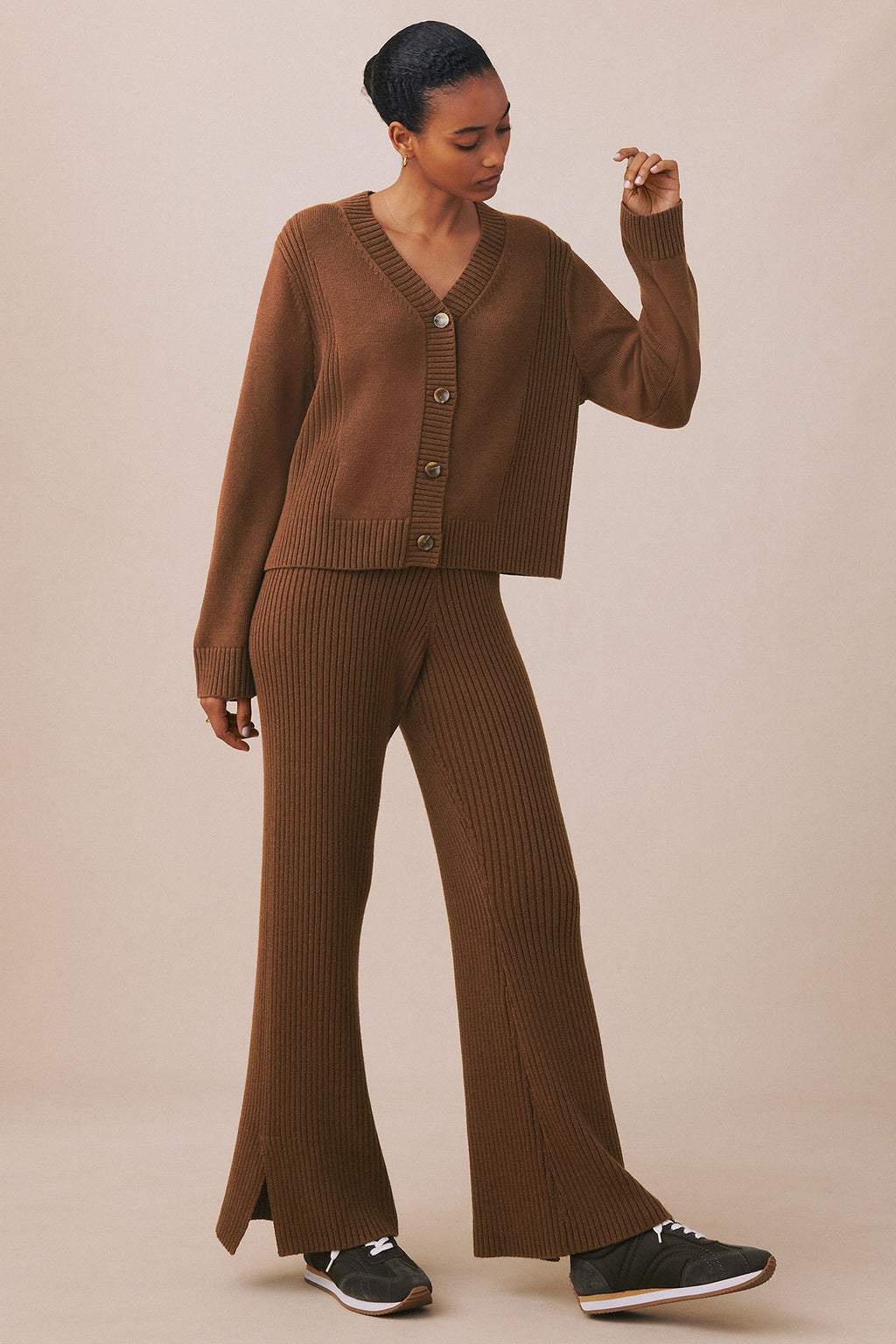 Cinnamon ribbed cardigan and matching pants set with button front and wide-leg silhouette.