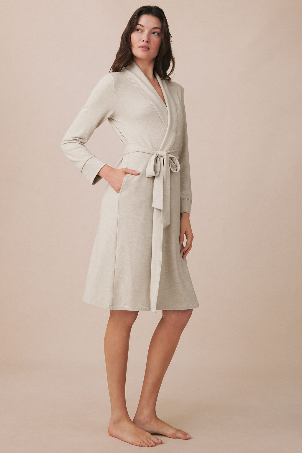 Oat heather wrap robe with long sleeves, tie waist, and front pockets on model.