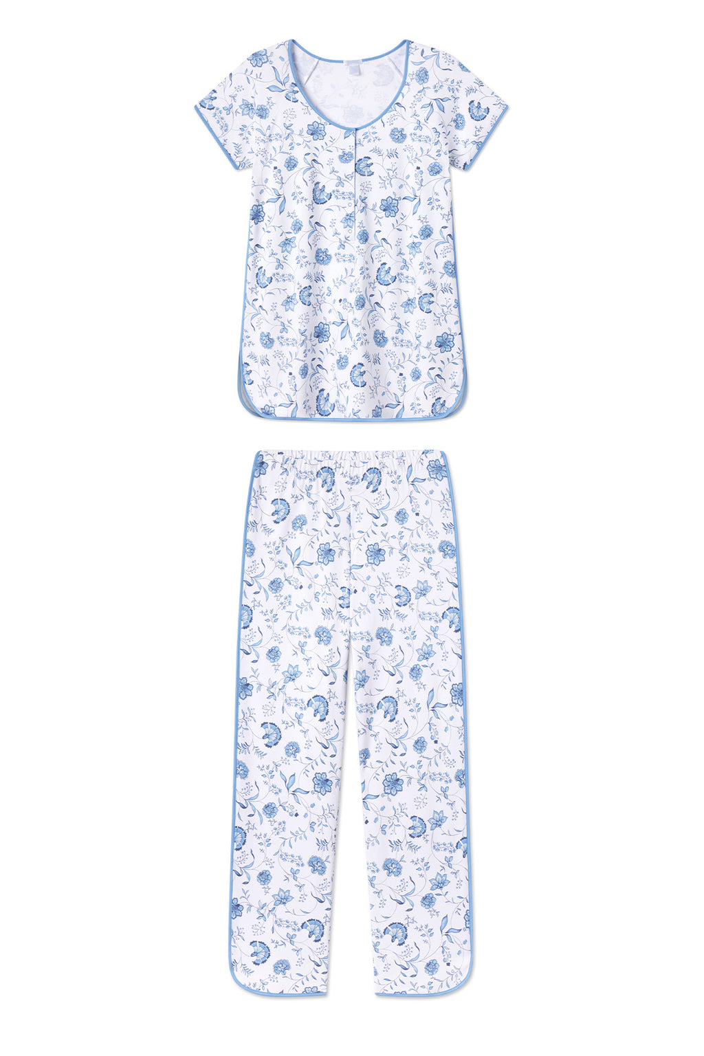 Two-piece maternity pajama set with blue floral print on white, short-sleeve top and full-length pants with blue trim.