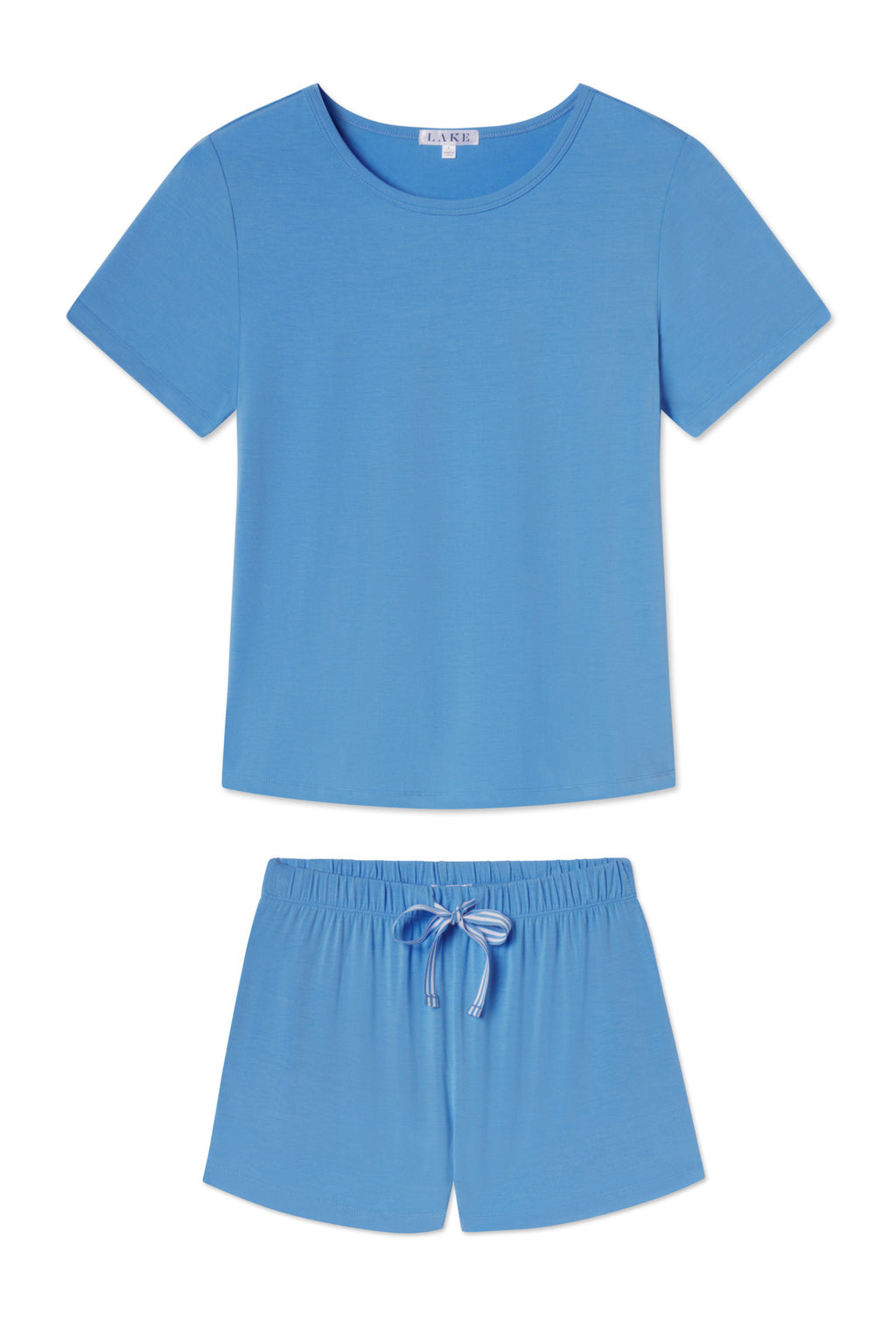 The DreamModal Ribbon Shorts Set in Regatta features a short-sleeve tee and pajama shorts with an elastic waistband and white drawstring, shown laid flat on a white background.