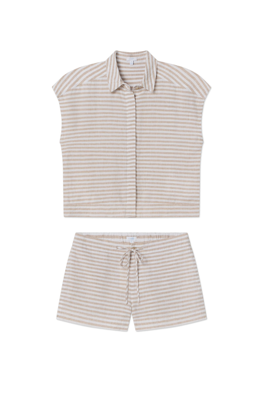 The Cruise Short Set in Sandstone Amalfi Stripe features a two-piece, short-sleeve collared button-up top and drawstring shorts in beige and white stripes—perfect for a women