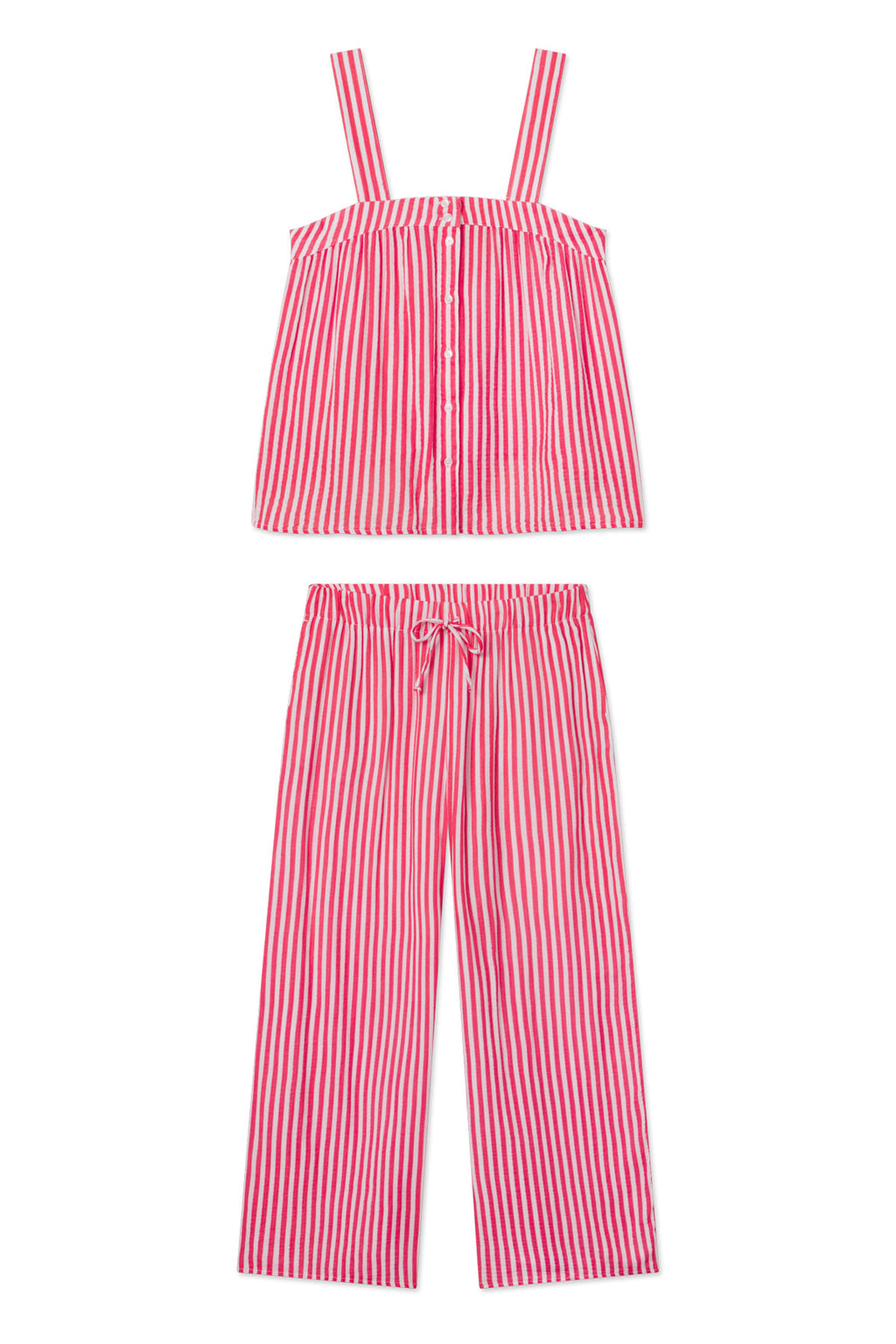 The Hamptons Pants Set in Bougainvillea Stripe Gauze is a women’s pajama set with a sleeveless, button-down top and matching pants, both in vertical pink and white stripes on lightweight gauze—ideal for hot sleepers.