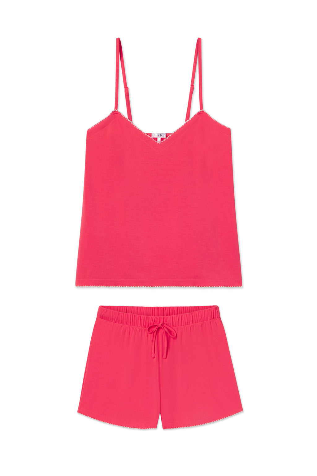 Bright pink cami top with scalloped edges and thin straps paired with matching shorts with drawstring waist.