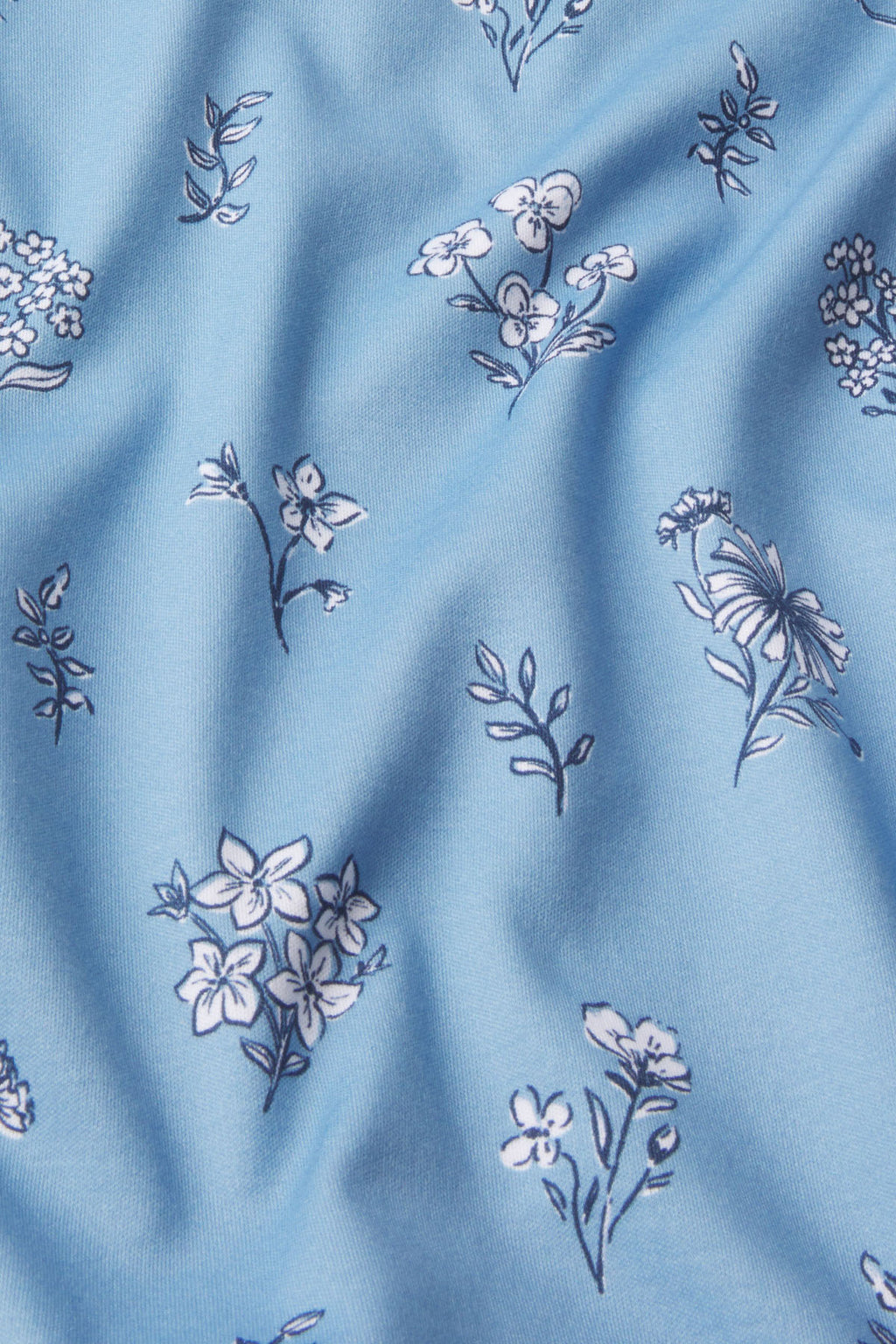 The Pima Crew Long-Short Set in Serene Blue Adeline Floral features soft Pima cotton with a delicate white floral print.