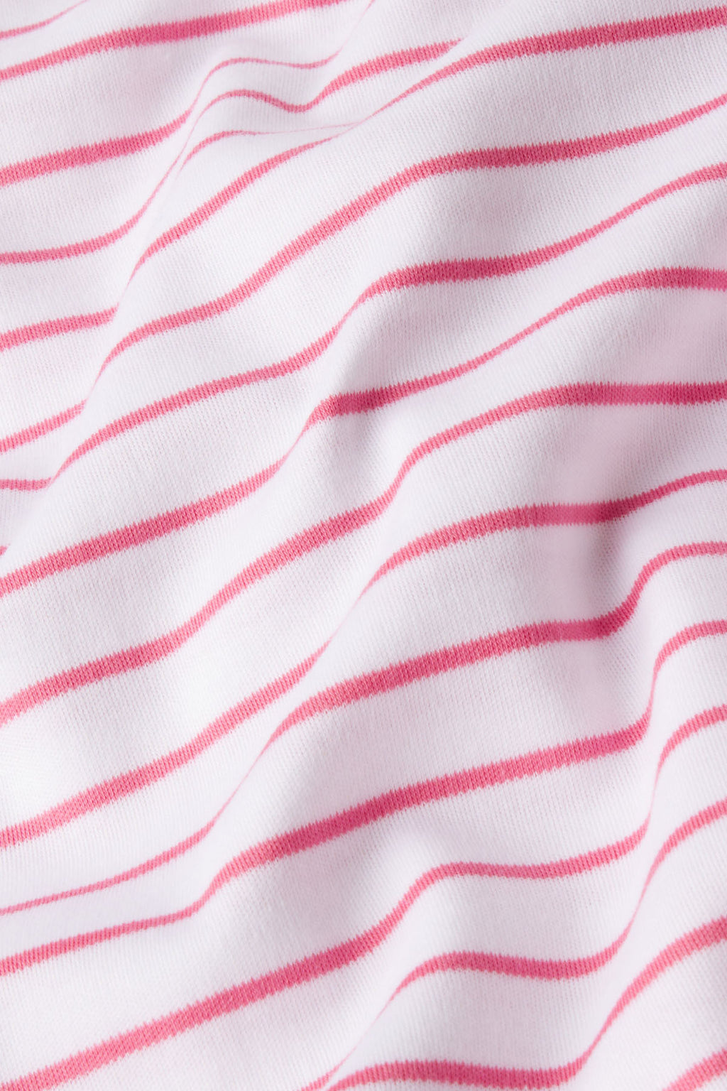 A close-up of the Pima Crew Long Sleeve Bundle in Winterberry Rowing Stripe—Pima cotton fabric with soft texture and horizontal pink stripes, perfect for cozy wear.