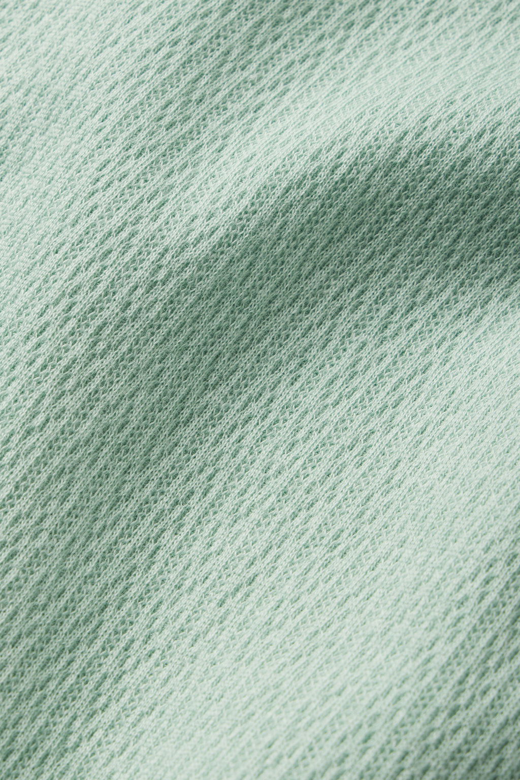 Close-up of Pointelle Shorts Bundle in Parisian Green Solid, featuring subtle diagonal pattern and gentle texture.