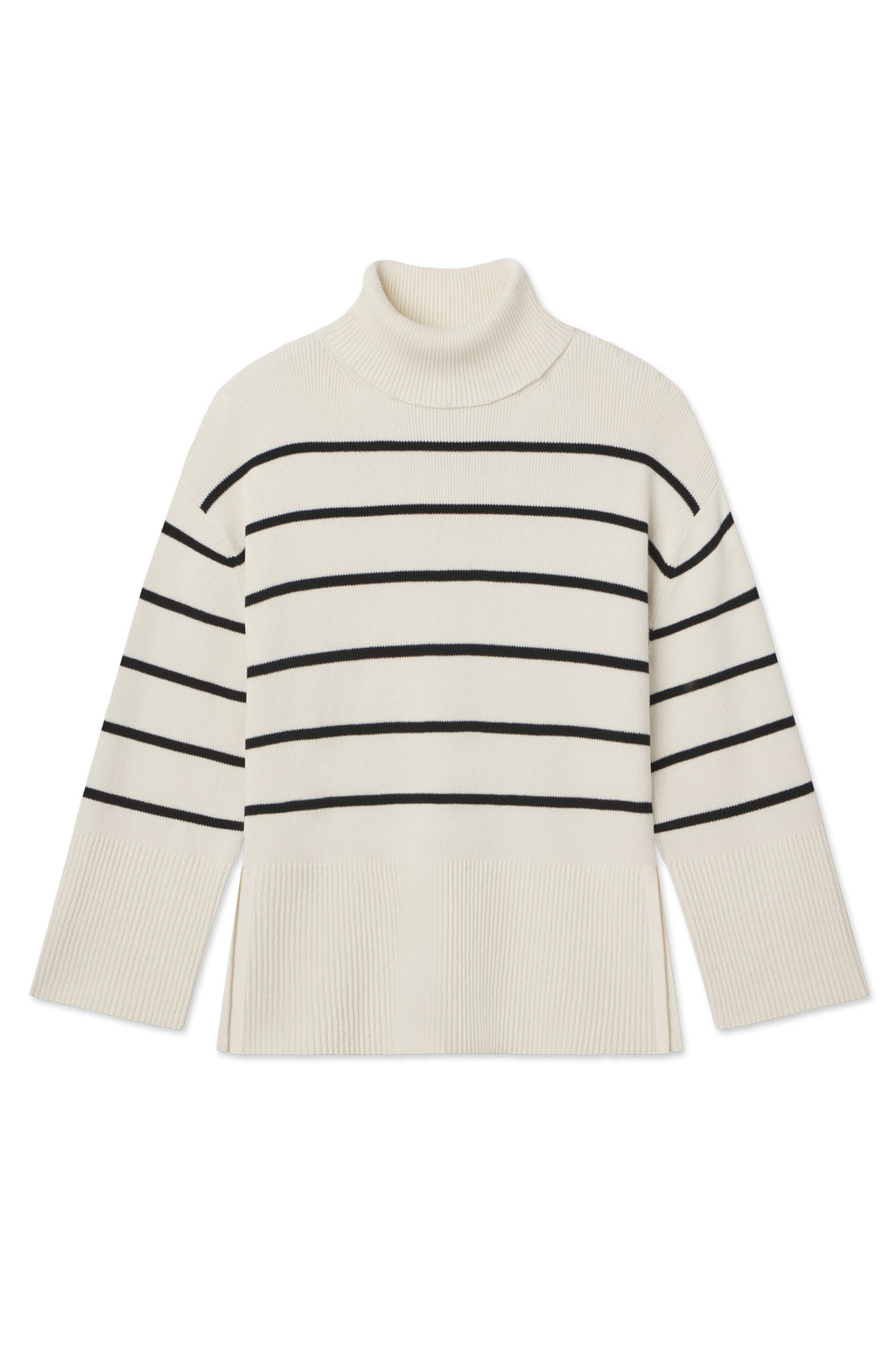 The Madeline Sweater in Ivory Black Stripe is a 100% cotton, oversized turtleneck with horizontal black stripes, wide ribbed cuffs and hem, relaxed boxy fit, and side slits at the hem.