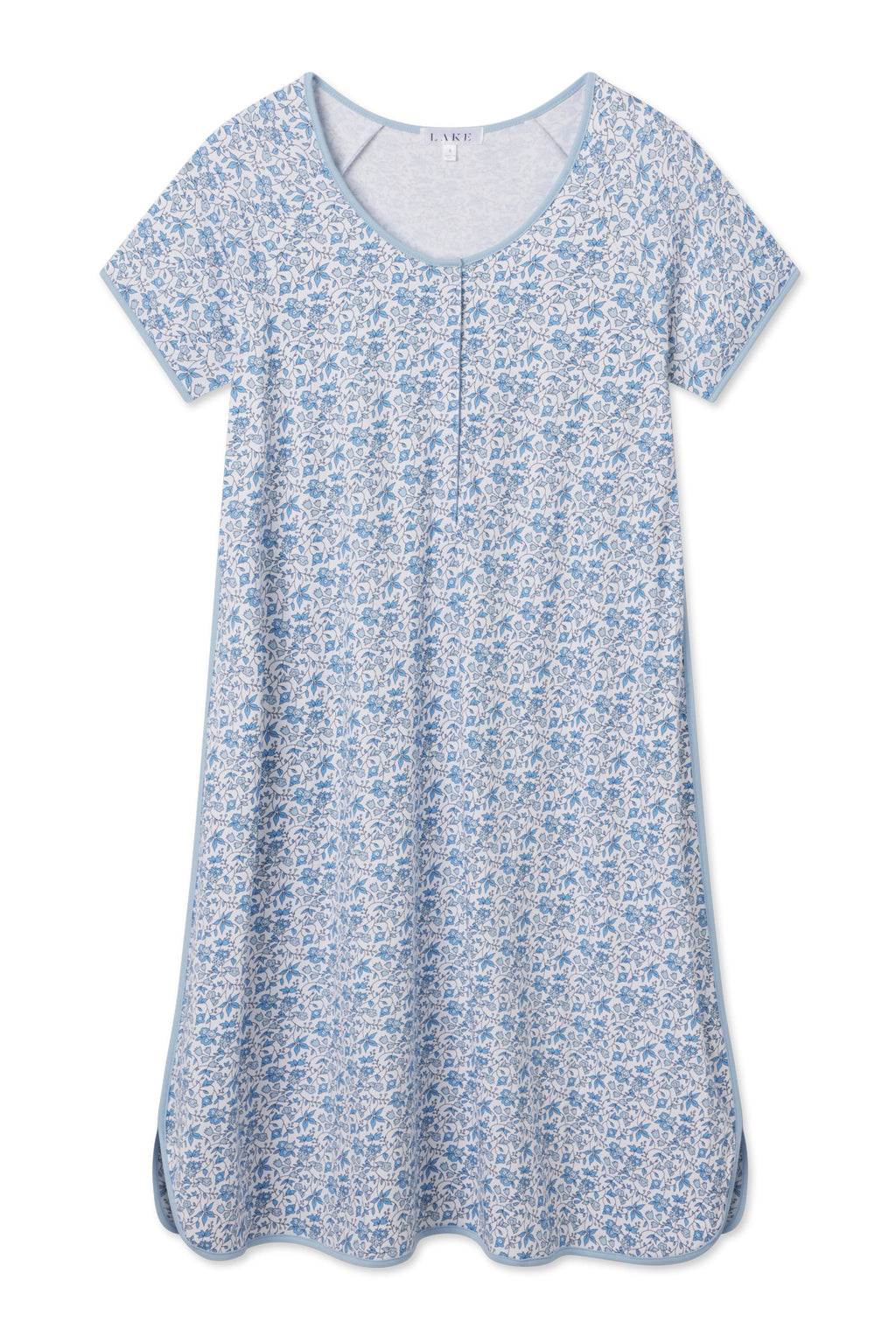 The Pima Maternity Nightgown in Delft Blue Garden Floral features short sleeves, a relaxed fit, soft Pima cotton fabric, and a round neckline—perfect for nursing mothers seeking comfort and style.