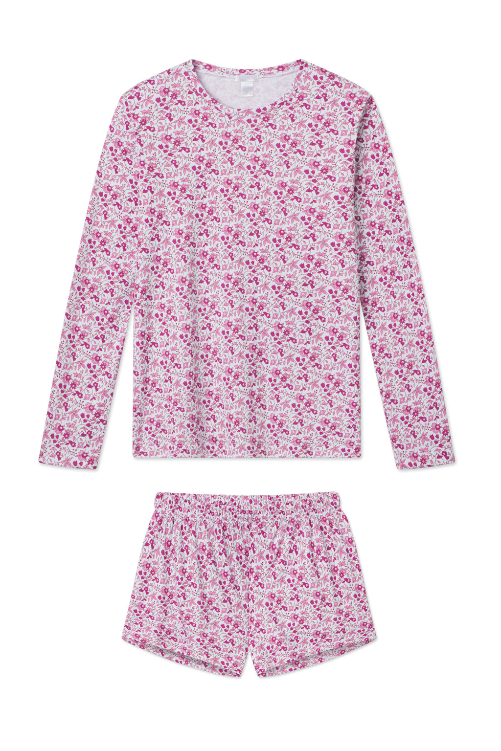 The Pima Crew Long-Short Set in Dahlia Garden Floral features a long-sleeve top and shorts in soft Pima cotton, showcasing pink and purple floral patterns on a white background.