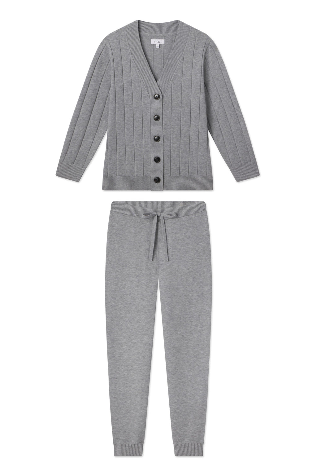 The Vesper Jogger Set in Gainsboro Gray is a matching loungewear set with a button-up V-neck cardigan and drawstring jogger pants, both with ribbed detailing.