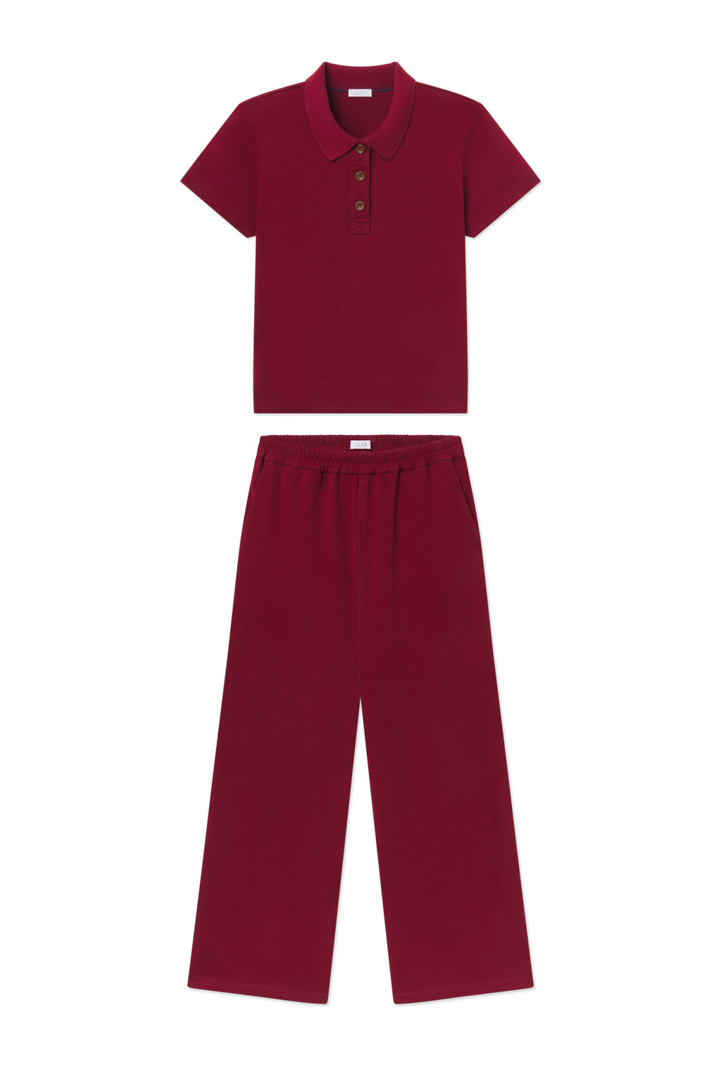 Deep burgundy two-piece set with short-sleeve collared polo top and wide-leg pants with elastic waistband.