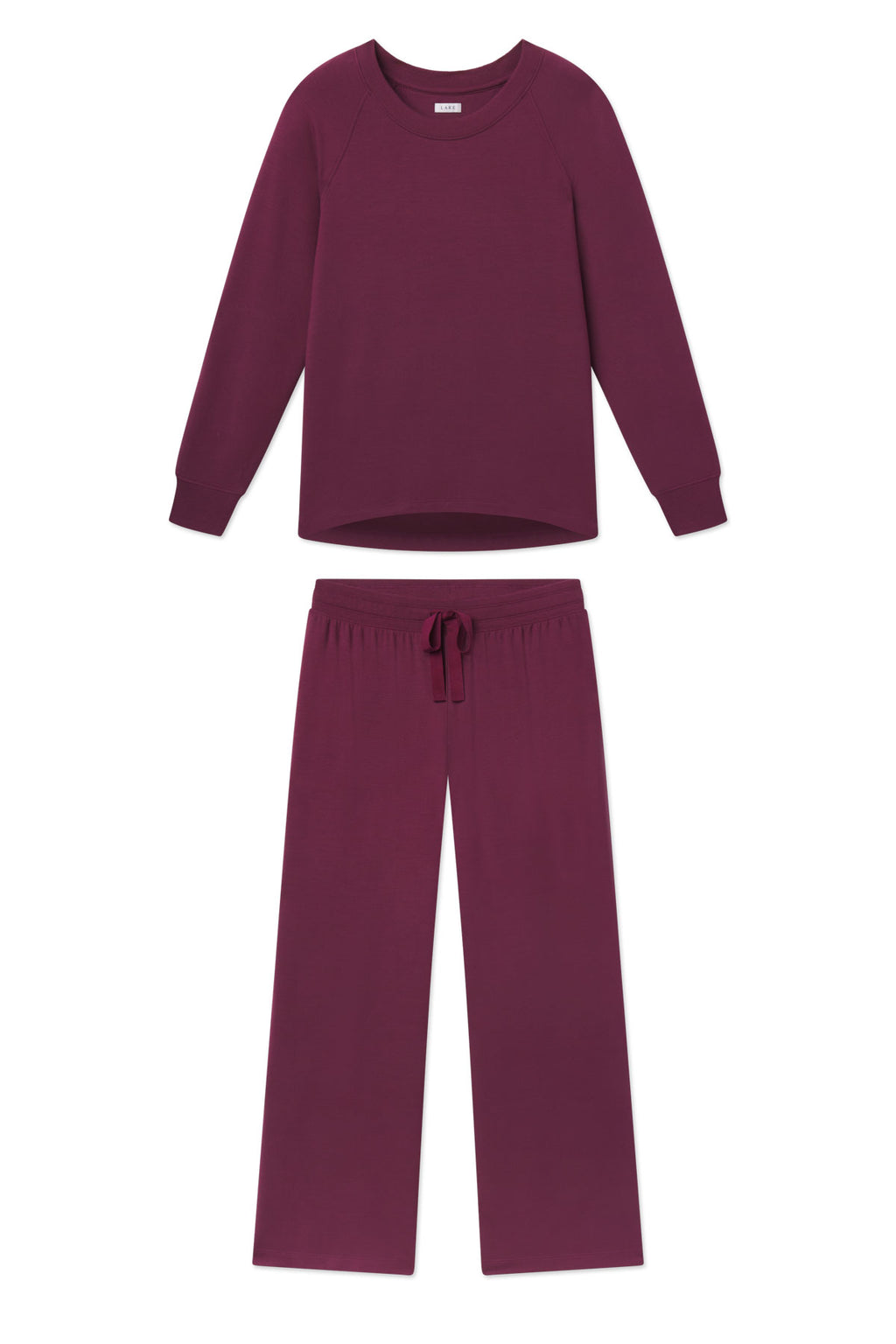 Two-piece lounge set in fig purple with long-sleeve sweatshirt and drawstring pants.