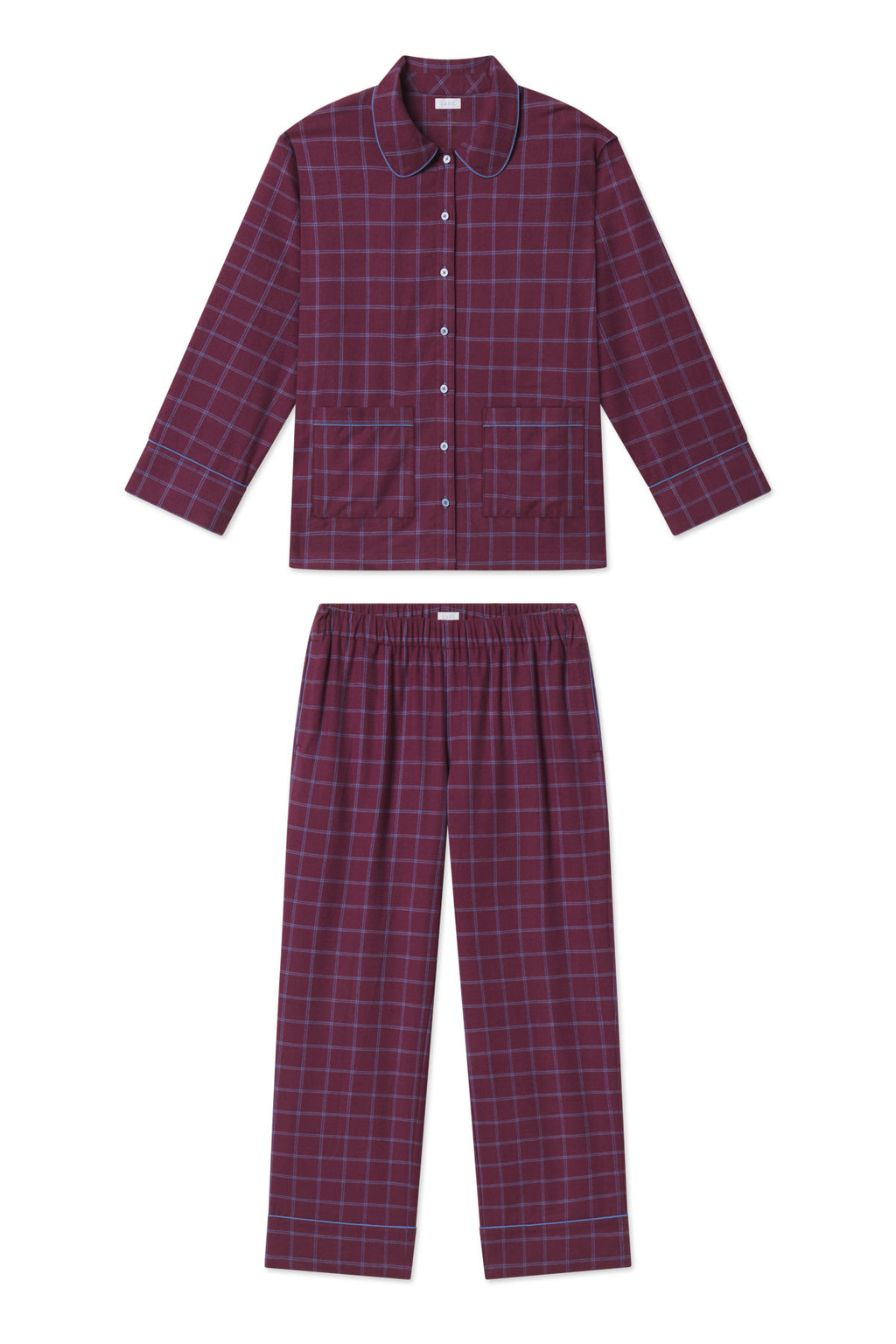 Two-piece flannel pajama set in burgundy windowpane pattern with button-up shirt and elastic-waist pants.
