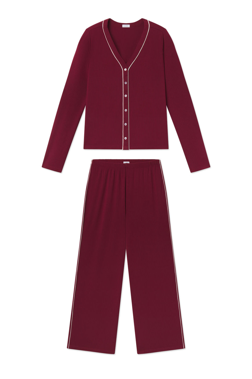 Burgundy ribbed two-piece set with button-front cardigan and wide-leg pants, both featuring white piping trim.