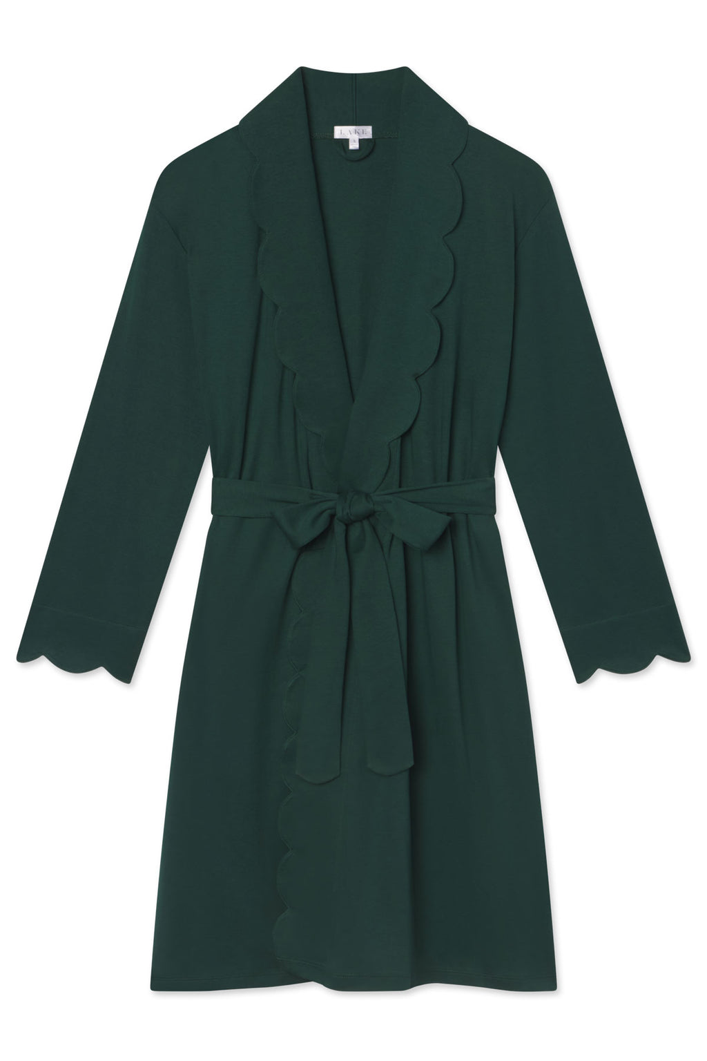 The Pima Scallop Robe in Conifer is a dark green long-sleeve lounge robe with scalloped edges on the collar, cuffs, and hem, a matching fabric waist belt, and soft Pima cotton construction.