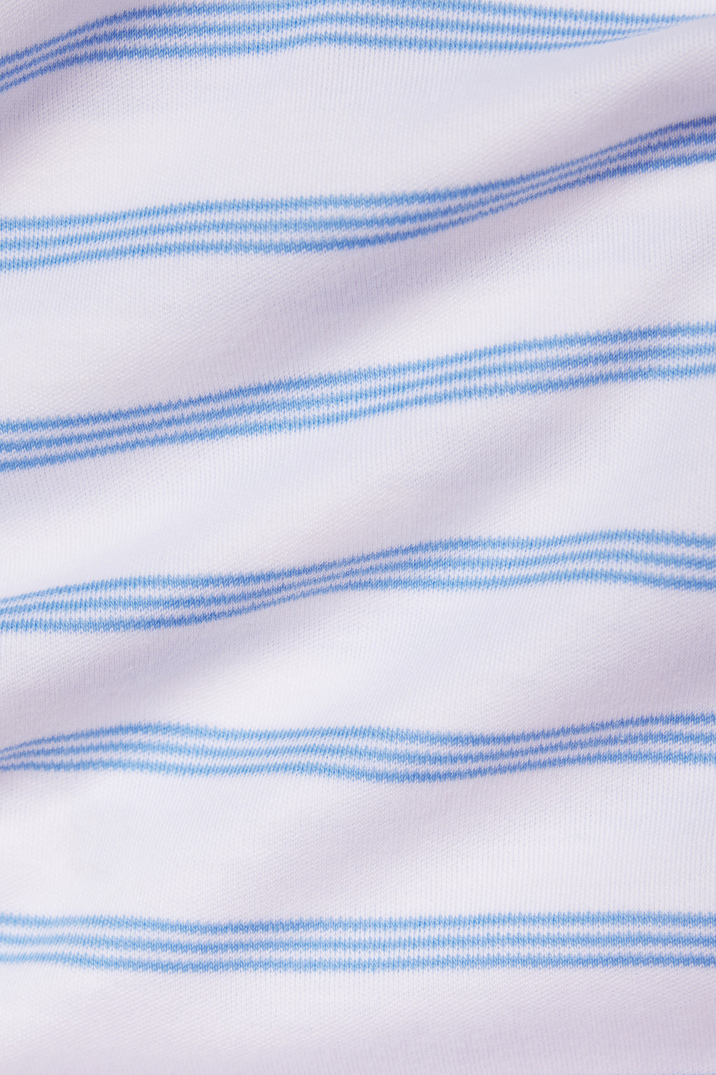 The Kids Shorts Set in Baltic Blue Triple Stripe features soft white Pima Cotton with thin, evenly spaced Baltic Blue horizontal stripes—an ideal gentle pattern for children.