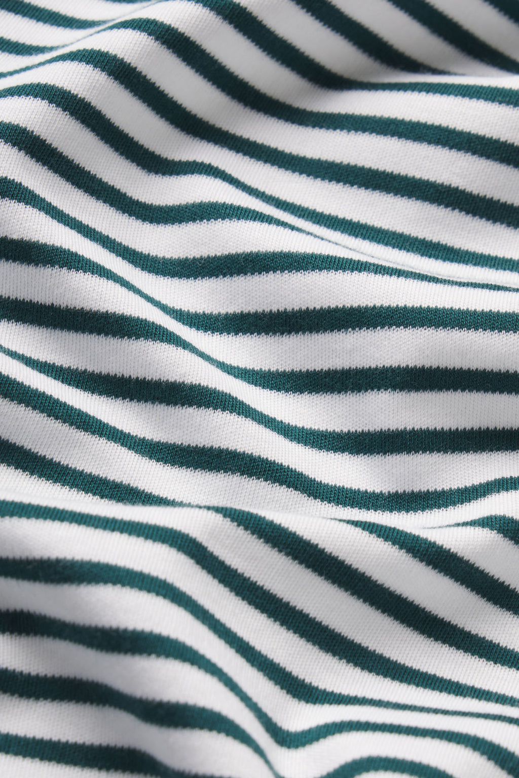 Teal and white horizontal striped knit fabric with ribbed texture detail.