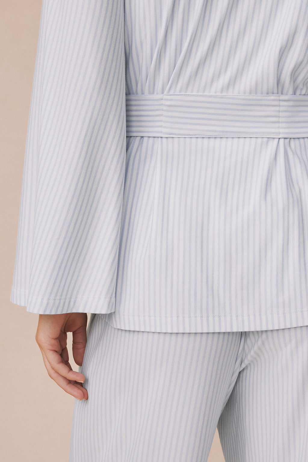 Light gray ribbed kimono and matching pants with coordinating striped belt tie at waist.