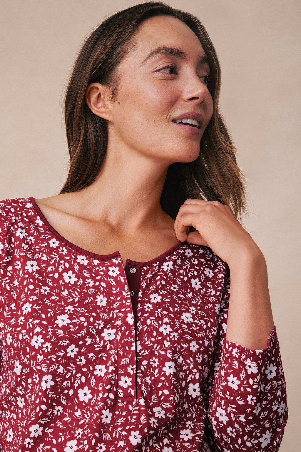 Garnet long-sleeve nightgown with white floral print and button front closure.