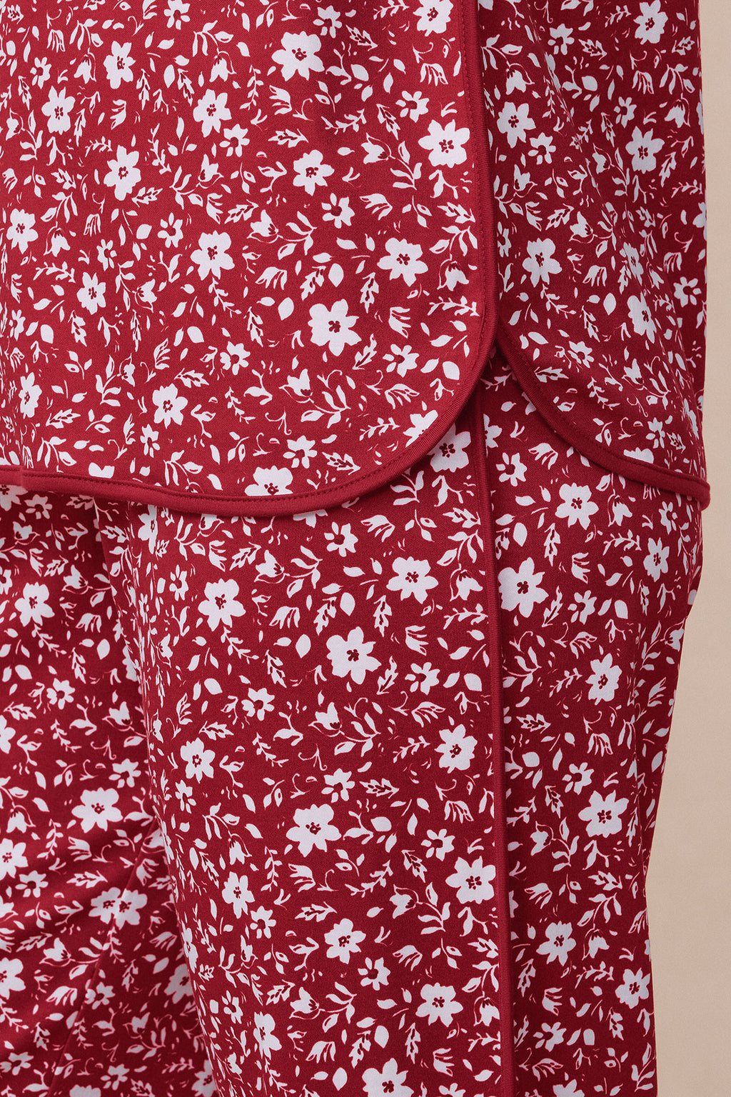 Garnet red Pima cotton pajama set with white floral and botanical print throughout.