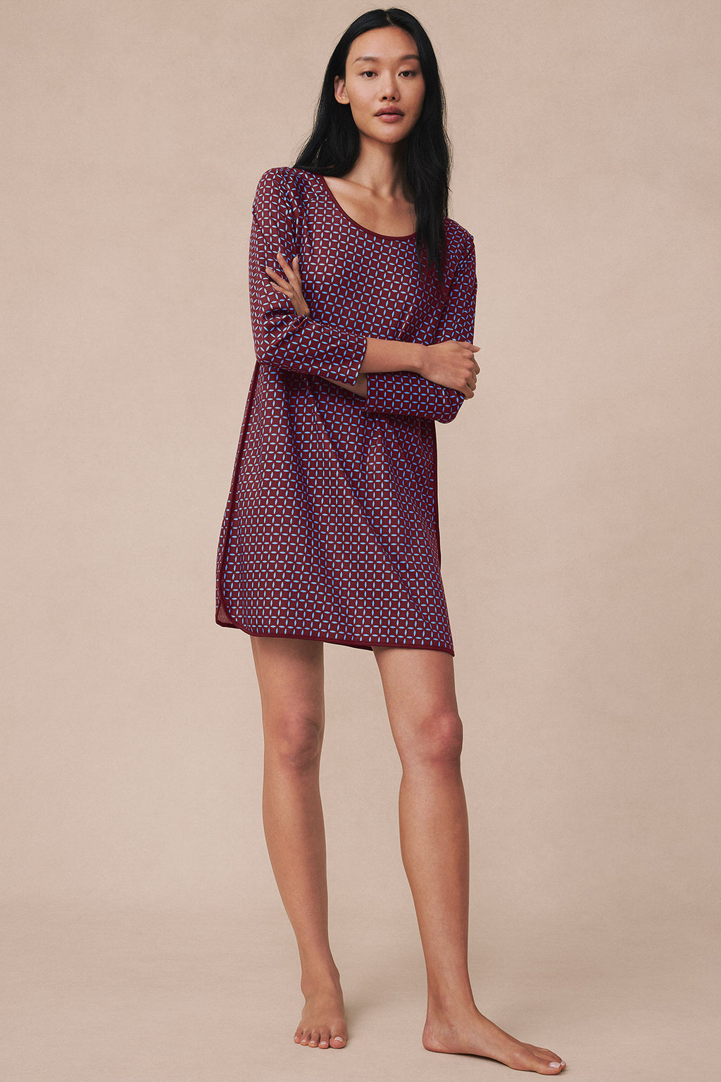 Burgundy nightgown with starburst pattern and three-quarter sleeves on model.