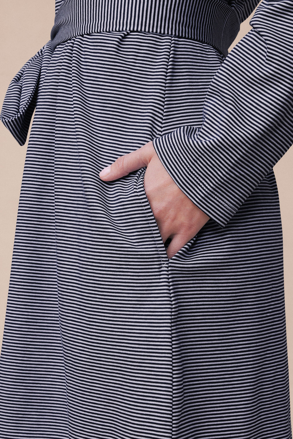 Navy and white striped short robe with long sleeves and front pockets.