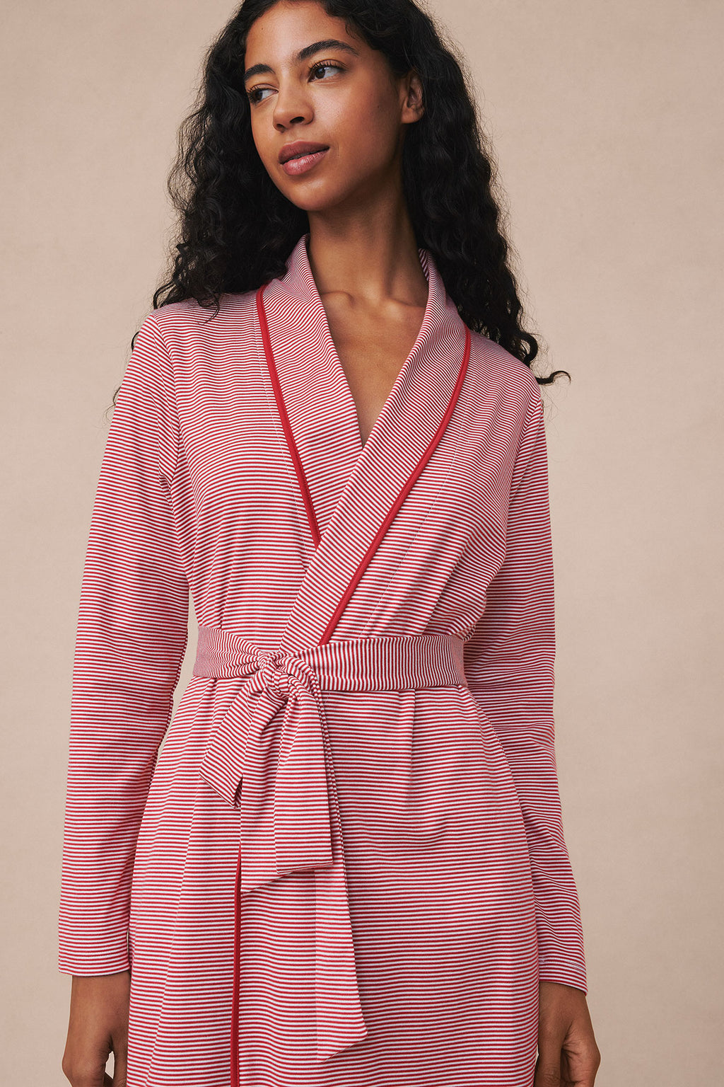 Garnet and white striped short robe with wrap front and tie waist, worn by model.