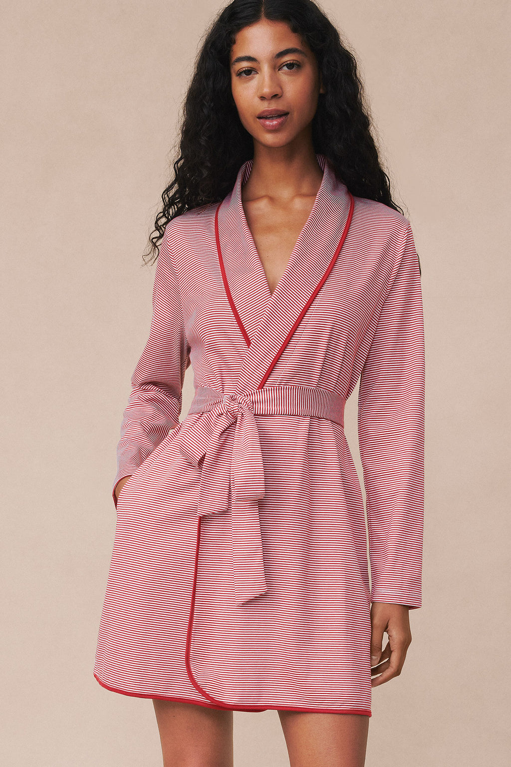 Short robe with garnet and white mini stripe pattern, wrap front closure, and tie belt at waist.