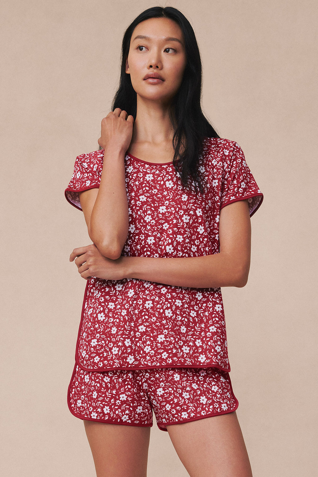Garnet Telfair floral shorts set with white botanical print on short-sleeve top and matching shorts.