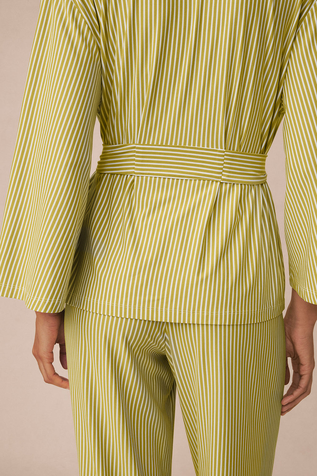 Yellow and white vertical striped three-piece kimono set with matching pants and tied waist belt.