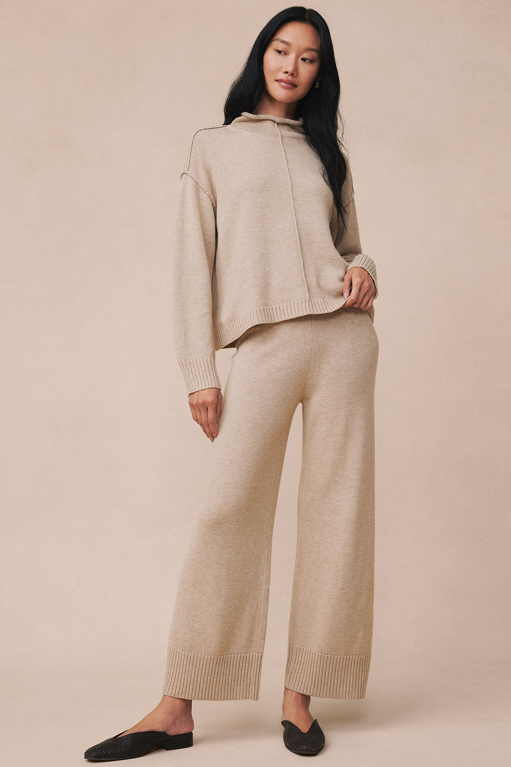 Beige heather sweater and matching wide-leg knit pants with ribbed cuffs and trim.