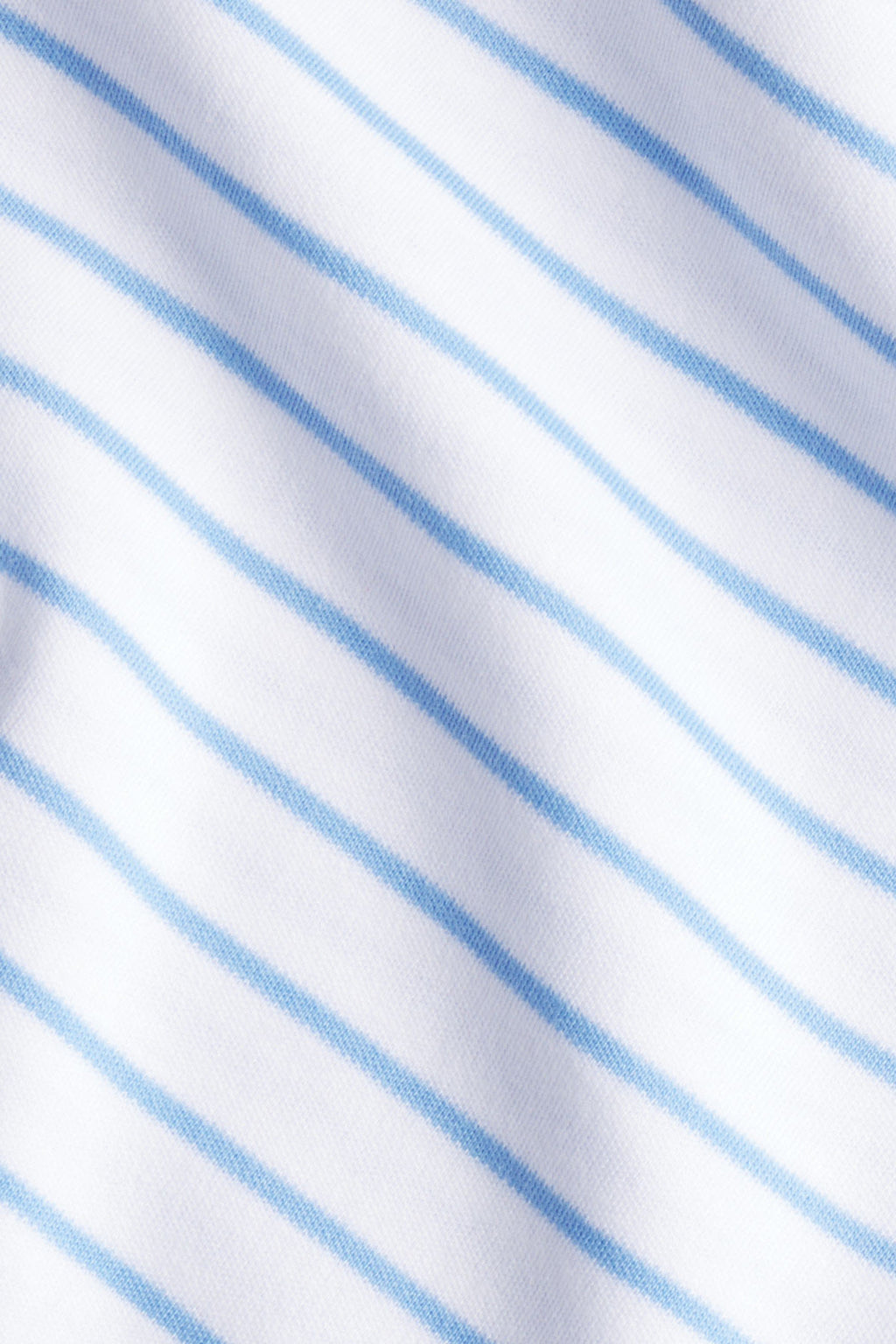 A close-up of the Pima Crew Long-Long Set in Baltic Blue shows soft white Pima cotton fabric with thin, evenly spaced light blue stripes—perfect for a classic crewneck look or pairing with high-waisted pants.