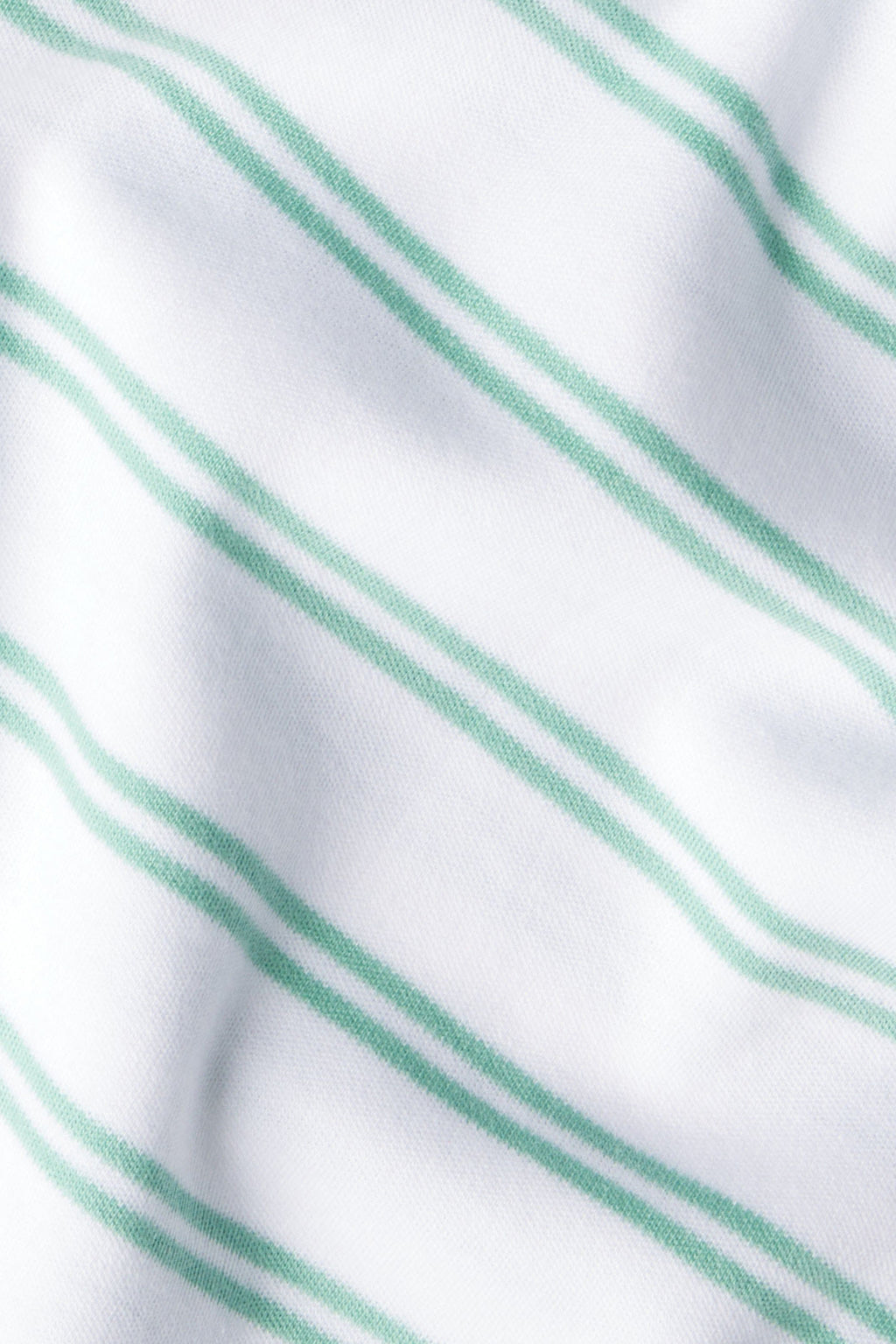White and sage green striped Pima cotton fabric with diagonal texture.