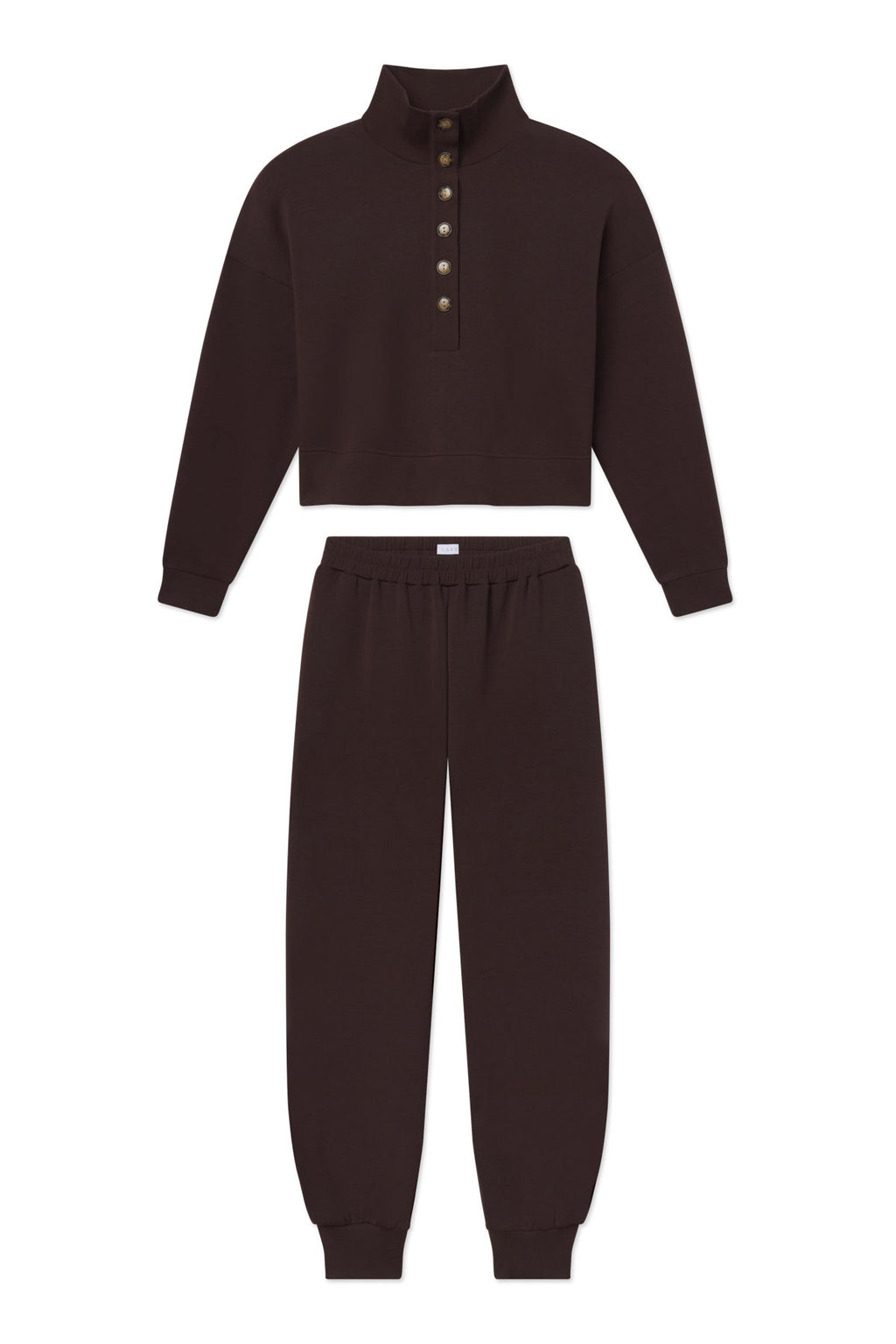Dark brown cropped pullover with button placket paired with matching jogger pants with elastic waistband.