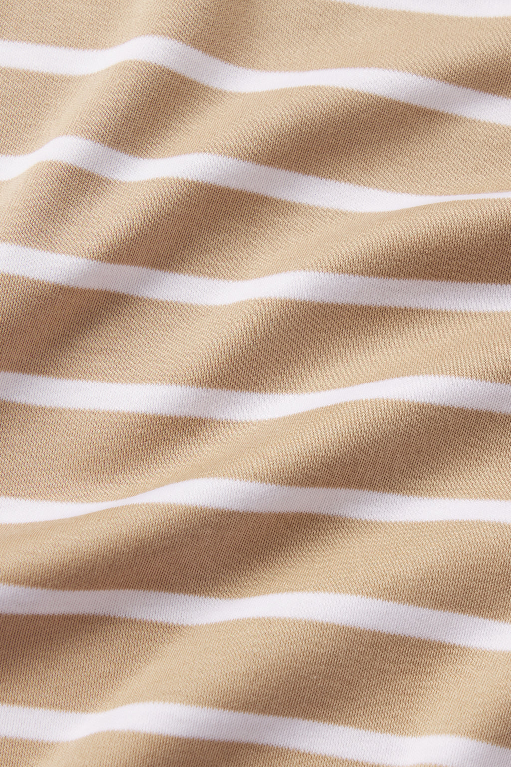 Close-up of beige Pima Cotton fabric with white stripes, showing its soft texture and gentle folds—ideal for the Pima Crew Long-Short Set in Sandstone Anchor Stripe.