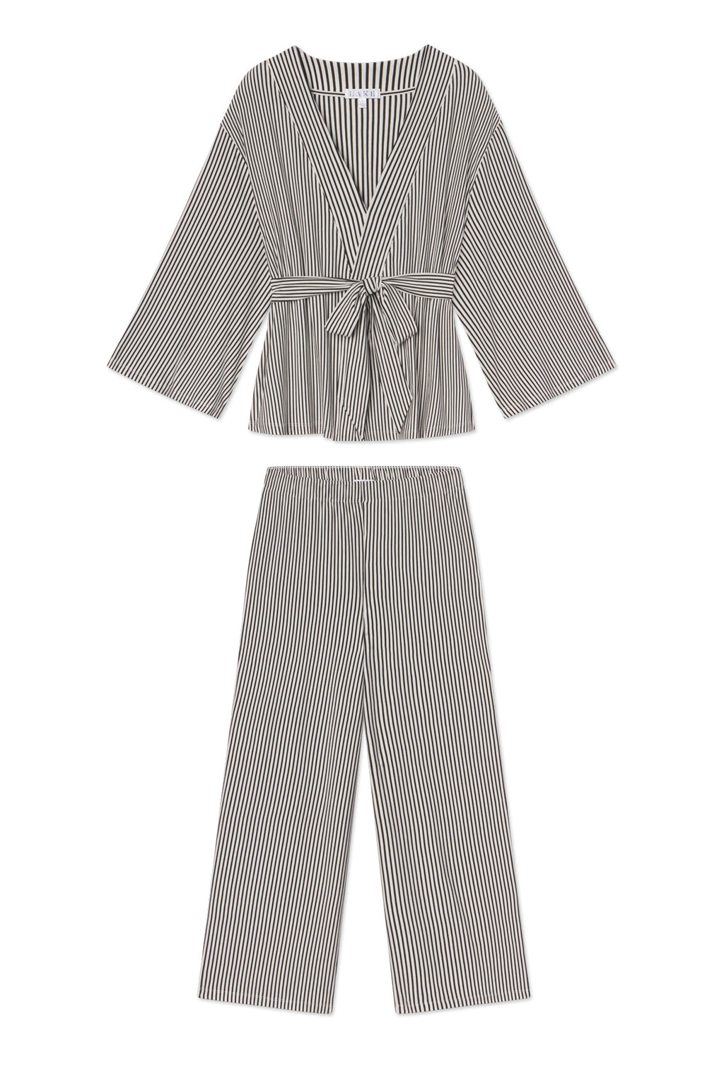 The DreamModal Kimono Pajama Set in Black Pencil Stripe features nursing-friendly long sleeves, a front-tie wrap top, and wide-leg pants with black and white vertical stripes, shown laid flat on a white background.