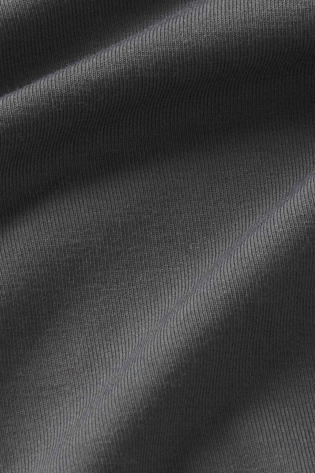 Shadow gray ribbed textile fabric with vertical striped pattern and natural folds.